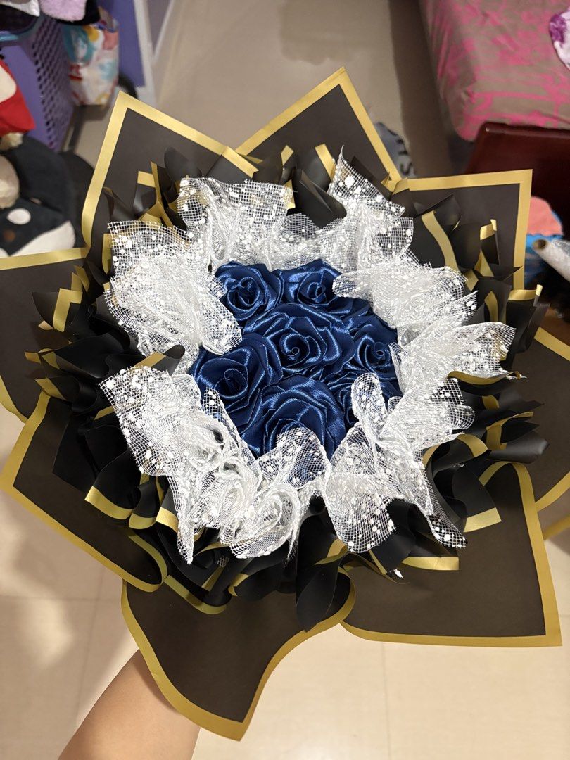 7 count blue satin flower bouquet (Category: Flowers & Bouquets) located in Taguig. Submitted by riverphoenix24 (Listing ID 1460350133, Image 1). Description: Can also make custom bouquets.