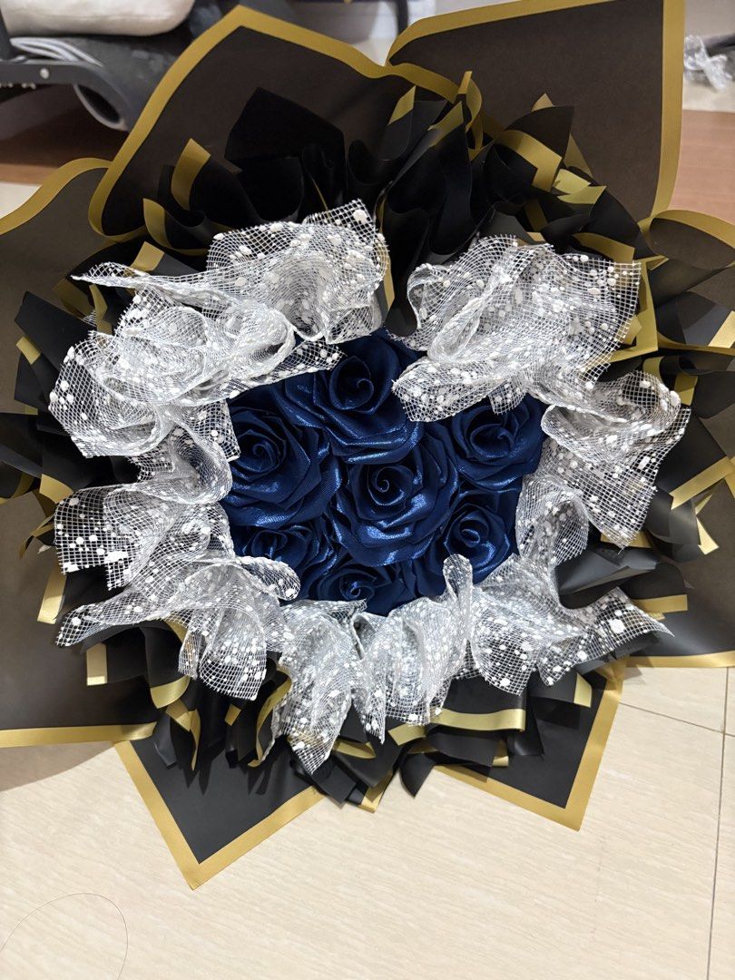 7 count blue satin flower bouquet (Category: Flowers & Bouquets) located in Taguig. Submitted by riverphoenix24 (Listing ID 1460350133, Image 2). Description: Can also make custom bouquets.