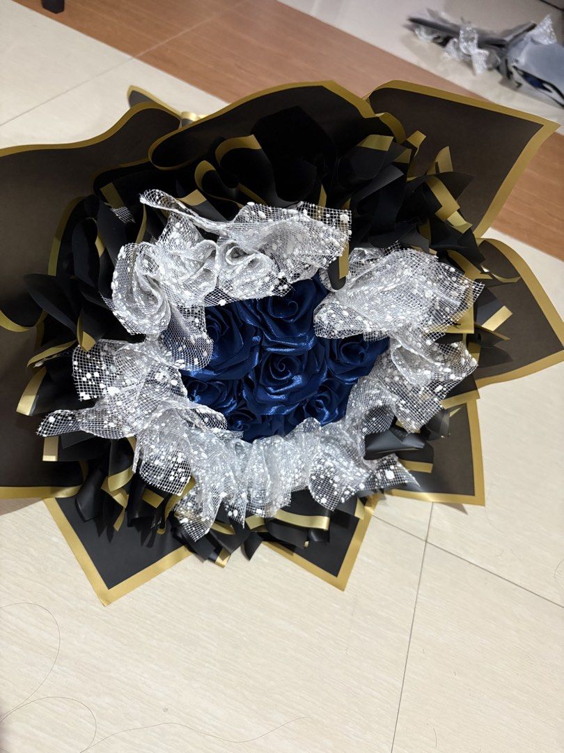 7 count blue satin flower bouquet (Category: Flowers & Bouquets) located in Taguig. Submitted by riverphoenix24 (Listing ID 1460350133, Image 3). Description: Can also make custom bouquets.