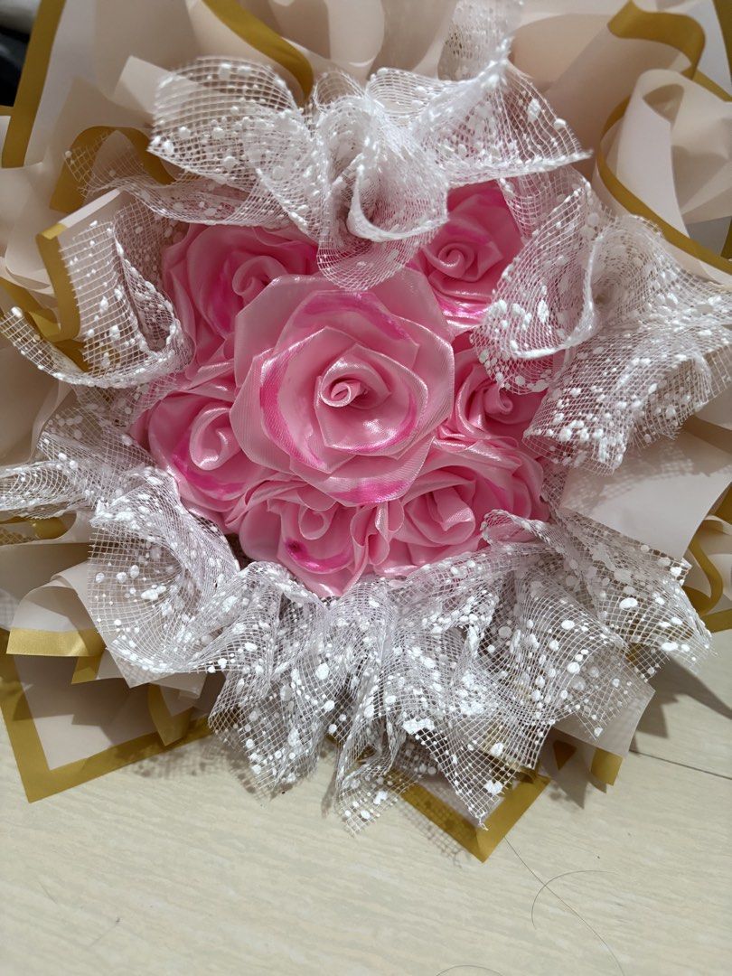 7 count pink satin flower bouquet (Category: Flowers & Bouquets) located in Taguig. Submitted by riverphoenix24 (Listing ID 1460349971, Image 2). Description: Can also make custom bouquets.