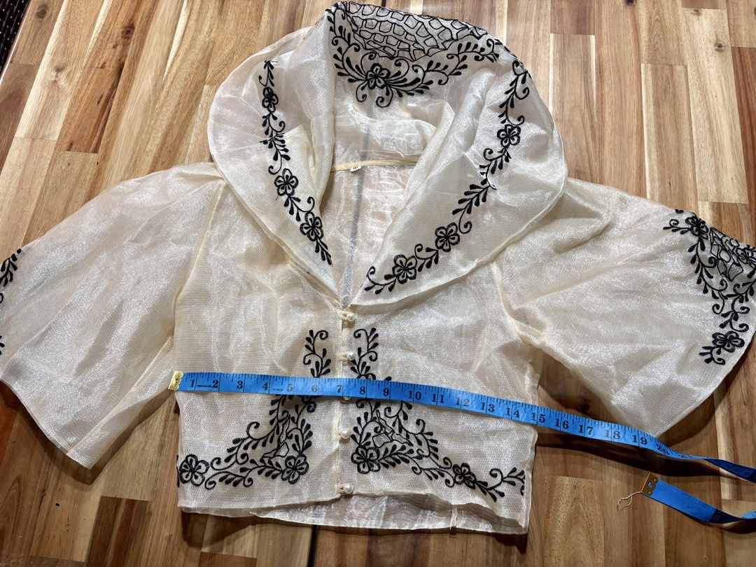 🤍 Embroidered Filipiniana Blouse | Small–Medium (Category: Blouses) located in Manila. Submitted by cutesybysdc (Listing ID 1460413907, Image 2). Description: Elegant Filipiniana-inspired blouse featuring beautiful black floral embroidery, sheer textured fabric, and delicate pearl-style buttons. Perfect for school events, office occasions, & any cultural celebrations. ✨ Details: * Size: Small–Medium frame * Color: Off-white/Cream with black embr