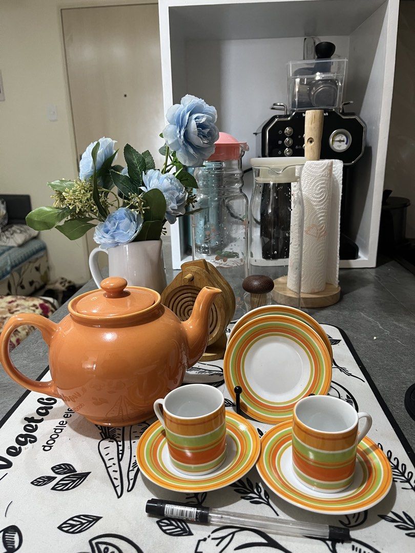 🍊 Mix & Match Ceramic Tea Set – PHP 250 (Category: Coffee & Tea Tableware) located in Caloocan City. Submitted by happypenguin-808164 (Listing ID 1460389322, Image 2). Description: Selling this beautiful mix & match ceramic tea set in a vibrant orange, green & cream colour combination. Includes: 1 × Orange ceramic teapot with lid 2 × Matching cups 2 × Saucers 1 × Extra plate ✨ Condition: Good / well maintained 💰 Price: PHP 350 for the set Perfe