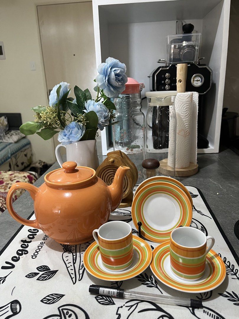 🍊 Mix & Match Ceramic Tea Set – PHP 250 (Category: Coffee & Tea Tableware) located in Caloocan City. Submitted by happypenguin-808164 (Listing ID 1460389322, Image 1). Description: Selling this beautiful mix & match ceramic tea set in a vibrant orange, green & cream colour combination. Includes: 1 × Orange ceramic teapot with lid 2 × Matching cups 2 × Saucers 1 × Extra plate ✨ Condition: Good / well maintained 💰 Price: PHP 350 for the set Perfe