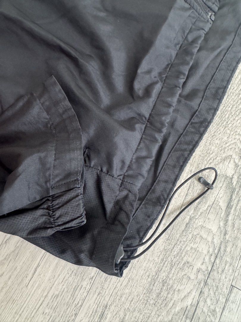 Adidas Black Windbreaker — fading silver detail (Category: Coats, Jackets and Outerwear) located in Manila. Submitted by celestial08 (Listing ID 1460445403, Image 3). Description: Well used but still wearable and functional. The silver detailing/line has visible fading from use. Please see photos for the actual condition. Selling as-is..