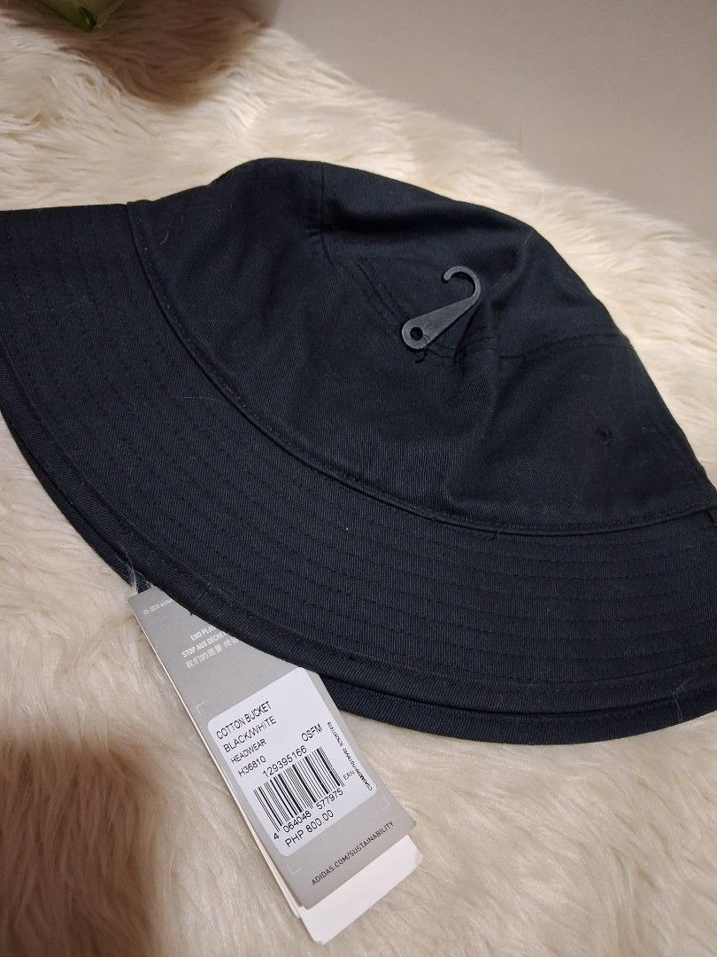 ADIDAS BUCKET HAT NEGOTIABLE (Category: Caps & Hats) located in Quezon City. Submitted by jiejieph (Listing ID 1460367360, Image 2). Description: - Classic black Adidas bucket hat - Made from 100% cotton - Iconic Adidas logo on the front - Ideal for sunny days and adding a sporty vibe - Easy to pack and wear anywhere - Simple and stylish design.