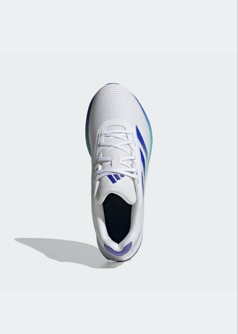 Adidas Duramo SL Running Shoes (Category: Sneakers) located in Cebu City. Submitted by geez_md (Listing ID 1460492607, Image 2). Description: - White Adidas running shoes - Blue and teal accents - Breathable mesh upper - Lightweight design - Ideal for running or everyday wear - Size: 9 (US Men's).