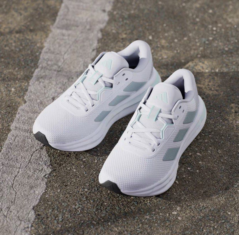 Adidas Galaxy 7 Running Shoes (Category: Casual Shoes) located in Cebu City. Submitted by geez_md (Listing ID 1460492757, Image 2). Description: - White Adidas running shoes - Mint green accents - Breathable mesh upper - Cushioned sole for comfort - Lace-up closure - Classic Adidas stripes - Perfect for running or everyday wear.