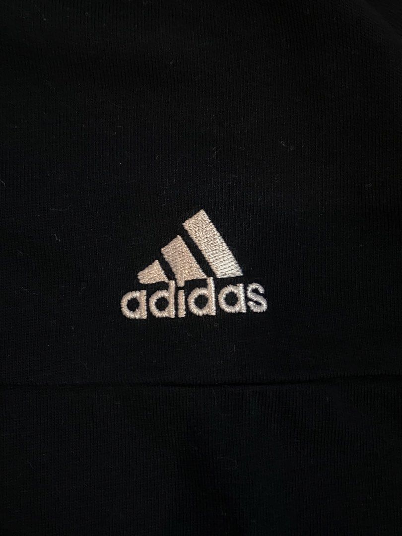 Adidas Performance Essentials Black T-Shirt (Category: Tshirts & Polo Shirts ) located in Manila. Submitted by sebthrift (Listing ID 1460370586, Image 3). Description: - Black Adidas T-shirt - White stripes on sleeves - Adidas logo on chest - Made in Cambodia - Size L (fits like 2XL) - Ideal for sports or casual wear.