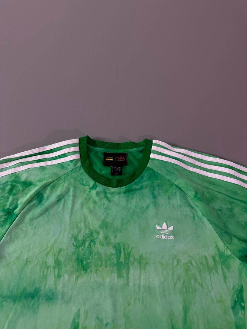 ADIDAS PHARRELL (Category: Tshirts & Polo Shirts ) located in Guagua. Submitted by sweetboyy (Listing ID 1460426085, Image 2). Description: ADIDAS PHARRELL EXCELLENT CONDITION / NO ISSUE SIZE LARGE ON TAG / DIMES L28 W23.
