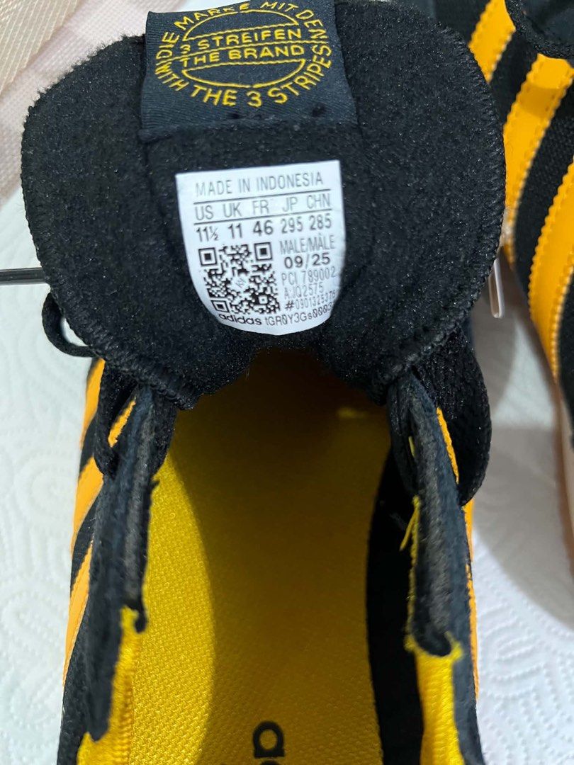 Adidas R71 (Category: Casual Shoes) located in Muntinlupa City. Submitted by mabelleadr46801 (Listing ID 1460415562, Image 2). Description: Fresh from USA 🇺🇸 No box Adidas Originals R71 Shoes (Style Code: JQ2575) in the Core Black / Crew Yellow / Gold Metallic colorway. This sneaker is an archival release heavily inspired by retro 1970s running silhouettes like the classic adidas Dragon. It features a lightweight mesh and soft suede upper paire