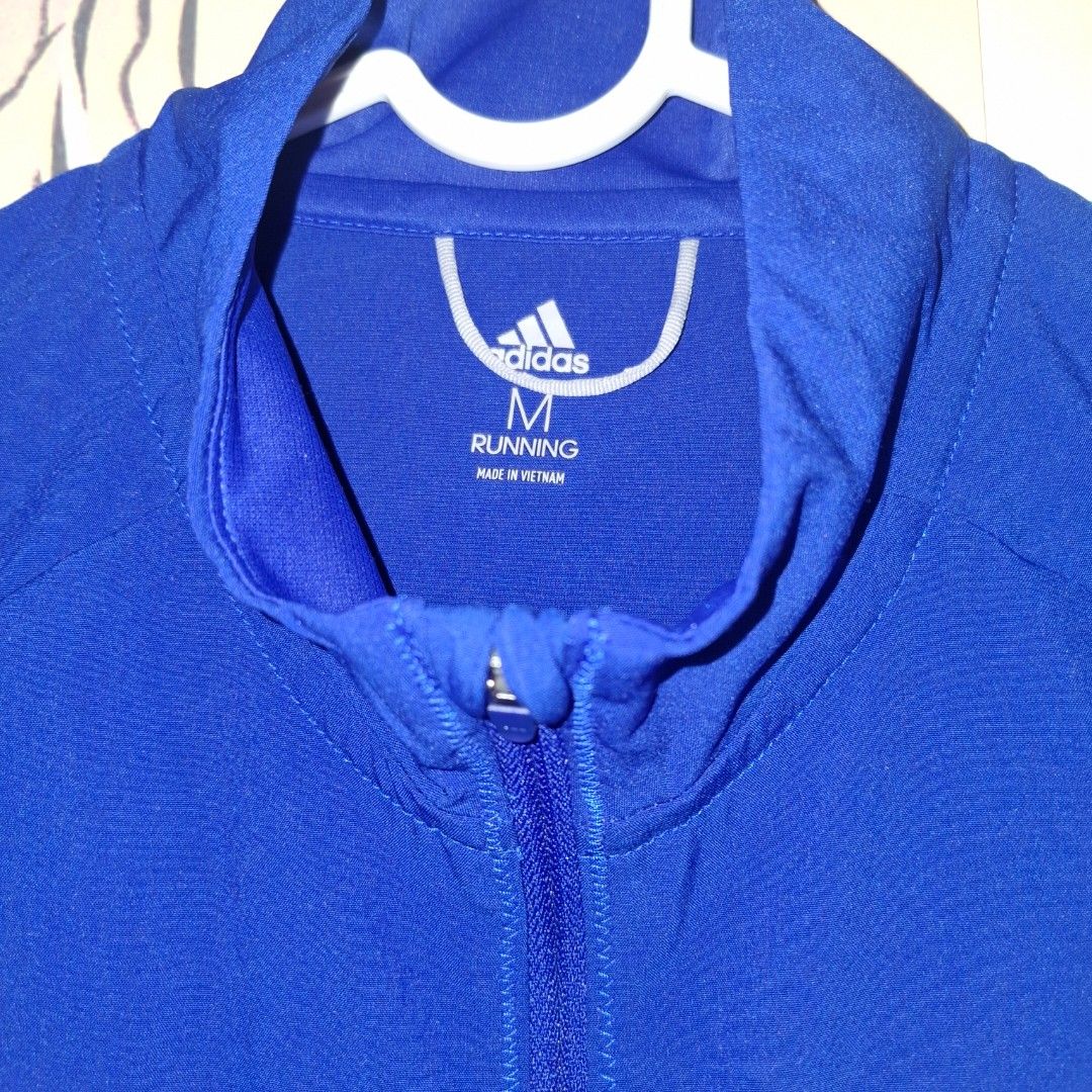 Adidas running jacket (Category: Activewear) located in Manila. Submitted by unfold.900 (Listing ID 1460314582, Image 3). Description: - it is an authentic blue adidas running jacket. - only worn once - wrong size - preloved location: sampaloc manila.