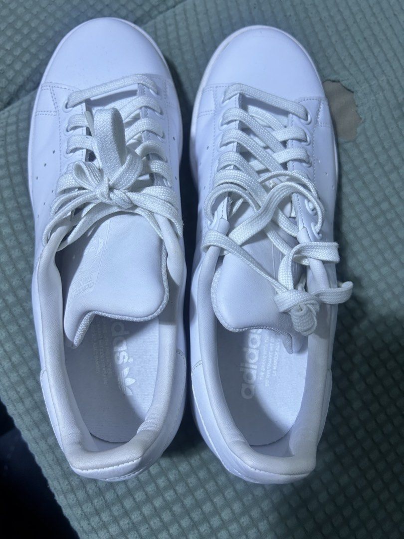 Adidas Stan Smith White Leather Sneakers (Category: Sneakers) located in Pasig City. Submitted by acirecruz (Listing ID 1460498058, Image 1). Description: - Classic white Adidas Stan Smith sneakers - Iconic leather version - Made in Vietnam - Size: 8 US / 7.5 UK - Clean and simple design - Great for everyday wear - New, never pang nagamit sa labas - Bought sa mismong adidas website - may box na kasama, hindi lang nasama sa picture 5,500 original 