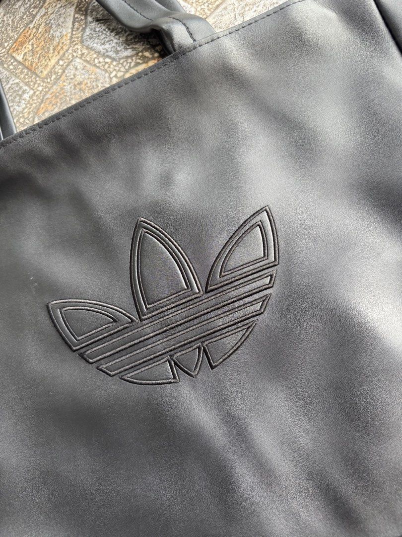 ADIDAS TOTEBAG (Category: Tote Bags) located in Manila. Submitted by psg_ni_gecko (Listing ID 1460306107, Image 2). Description: Brandnew Leather 1200 Location : Mandaluyong.