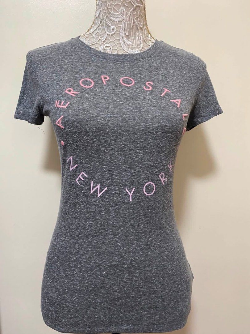 Aeropostale Grey T-shirt Size S (Category: Shirts) located in Manila. Submitted by airamef28.closet (Listing ID 1460422959, Image 1). Description: - Grey Aeropostale t-shirt - Features 'Aeropostale New York' in pink lettering - Made in Vietnam - Soft fabric for comfortable casual wear.