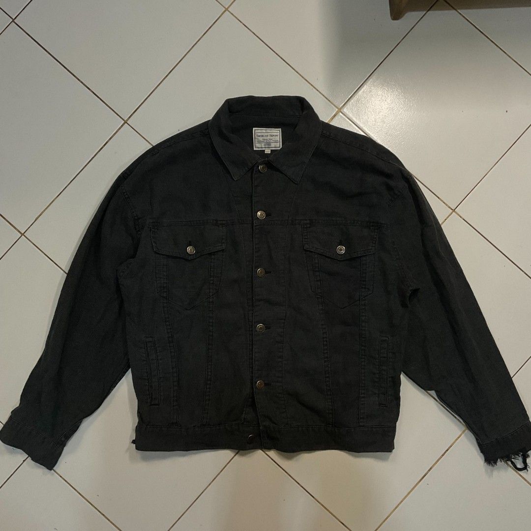 American Report Black Denim Jacket (Category: Coats, Jackets and Outerwear) located in Morong. Submitted by rusty.vault (Listing ID 1460457155, Image 1). Description: - Brand: American Report - Color: Black - Style: Classic Trucker Denim Jacket - Closure: Button-down - Pockets: Two chest pockets - Details: Frayed hem on sleeves - Occasion: Casual wear - Issue Hem W: 24 inch L: 24 inch Sleeve: 23 inch.