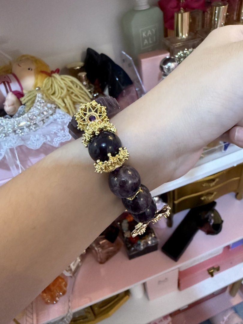Amethyst & Gold Charm Bracelet (Category: Bracelets) located in Caloocan City. Submitted by fashionshop248 (Listing ID 1460487677, Image 3). Description: - Auth amethyst charm & beads - Natural Stones -15.5cm wrist size ( pwede diy kung maliit) .