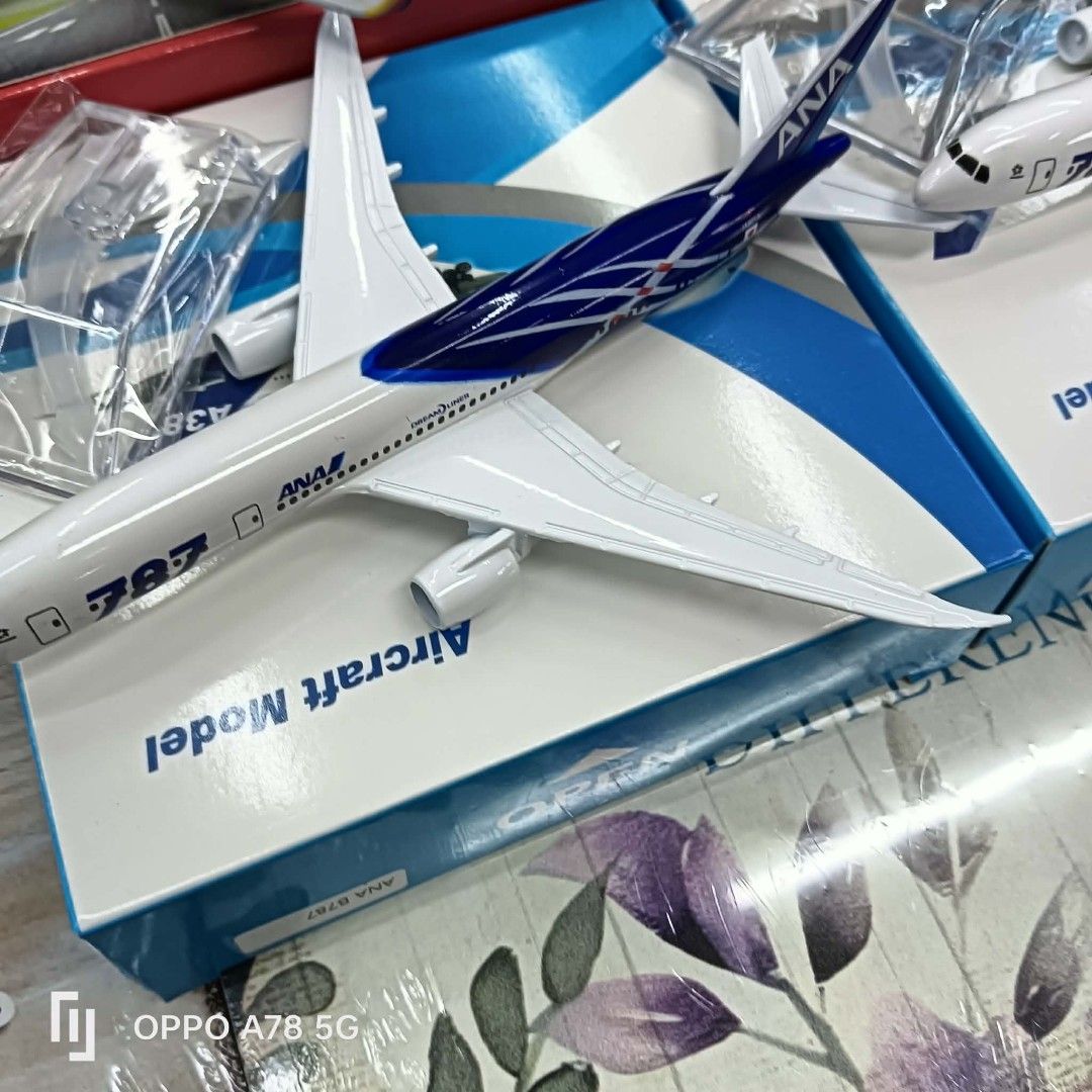 ANA Boeing 787 Dreamliner Aircraft Model (Category: Vehicle & Diecast Models) located in Manila. Submitted by iliasjen3082126 (Listing ID 1460474834, Image 1). Description: - Authentic ANA Boeing 787 Dreamliner aircraft model. - Comes brand new in its original packaging. - Ideal for aviation enthusiasts and collectors. - Features a highly detailed design showcasing the iconic ANA livery. - Model number ANA B787 clearly marked on the box..