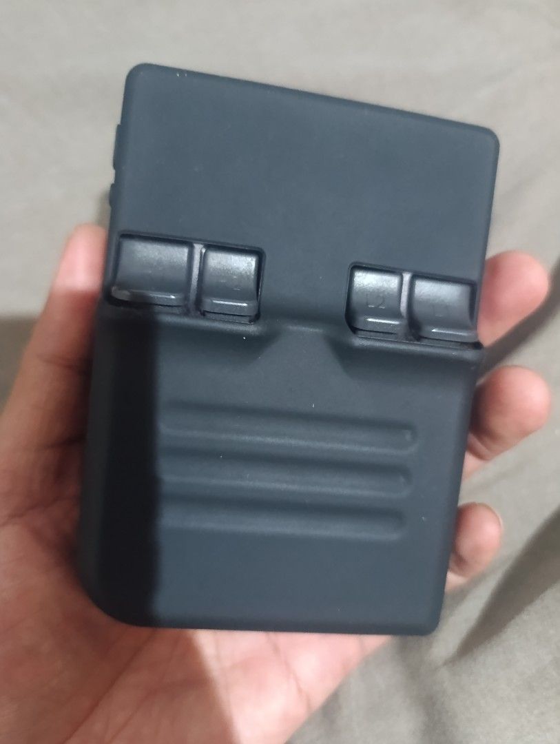 Anbernic RG35XX (Category: Others) located in Santa Cruz. Submitted by sirthirdz11955 (Listing ID 1460449587, Image 2). Description: - Handheld gaming device for retro games - Features D-pad, face buttons, and shoulder buttons - Built-in screen displaying game icons - USB-C charging port for convenience - TF card slot for expandable storage - Ideal for gaming on the go.