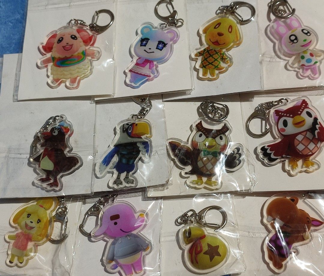 Animal Crossing & Squid Game Acrylic Keychains - P35 Each (Category: Character Goods) located in Baguio. Submitted by abigailmyra (Listing ID 1460331530, Image 2). Description: - Cute acrylic keychains featuring characters from Animal Crossing and Squid Game. - Perfect accessory for your bags or keys. - Available for only P35 each loc:Baguio-CAR.