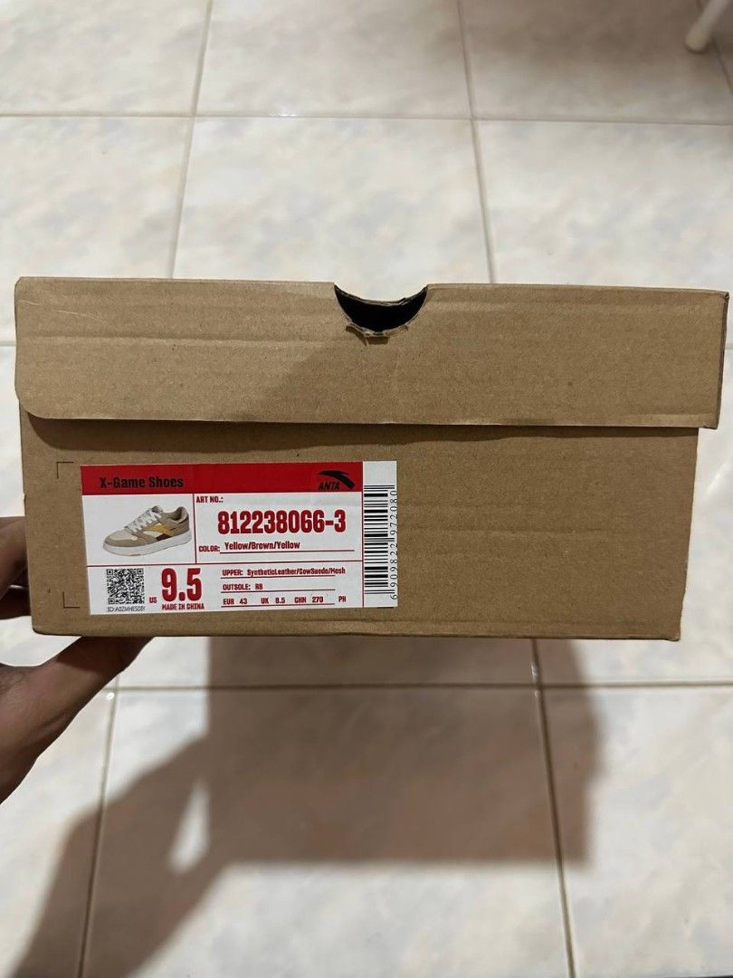 ANTA NEGOTIABLE (Category: Sneakers) located in Quezon City. Submitted by jiejieph (Listing ID 1460354219, Image 2). Description: - ANTA X-GAME Shoes - Size: 9.5 US - Color: Yellow, Brown, Yellow - Upper Material: Synthetic Leather, Cowhide, Mesh - Origin: Made in China - Includes: Original Box.