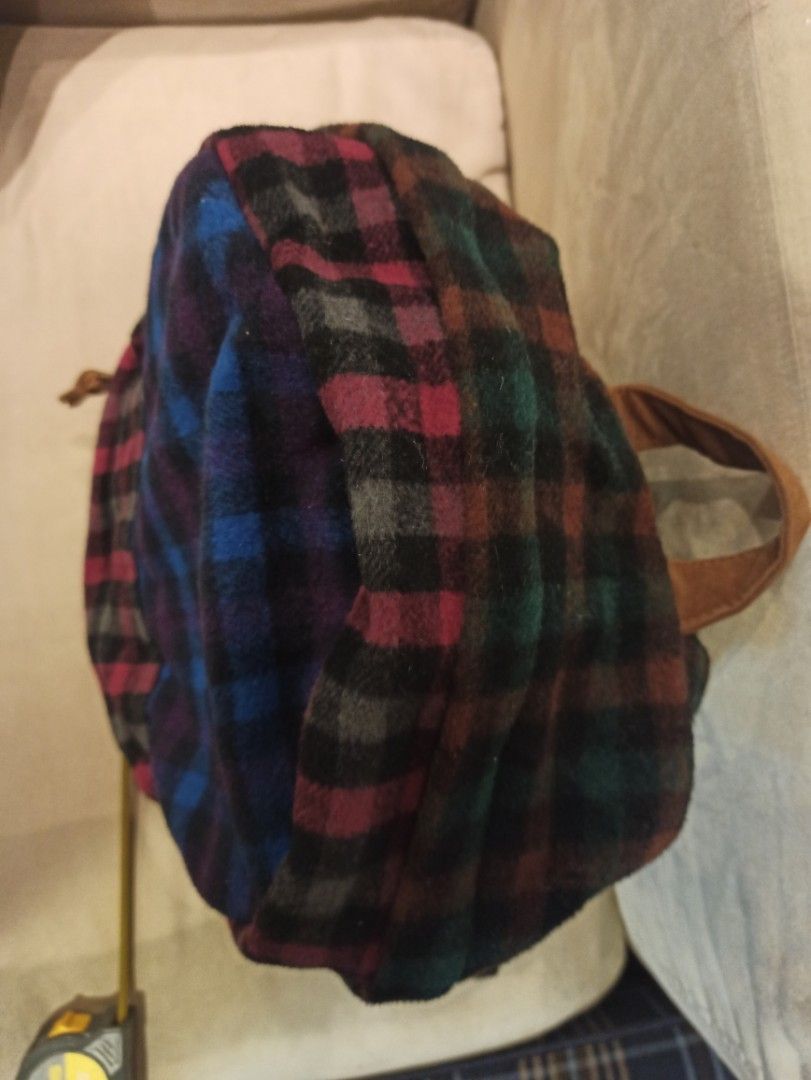 Arbore Plaid Flannel Backpack mixed color design (Category: Backpacks) located in Caloocan City. Submitted by rtarellano (Listing ID 1460434388, Image 3). Description: - Stylish plaid flannel backpack in blue, red, purple, and green checks. - Accented with durable brown leather details and straps. - Bright and fun orange interior lining. - Ideal for everyday adventures or your next getaway..