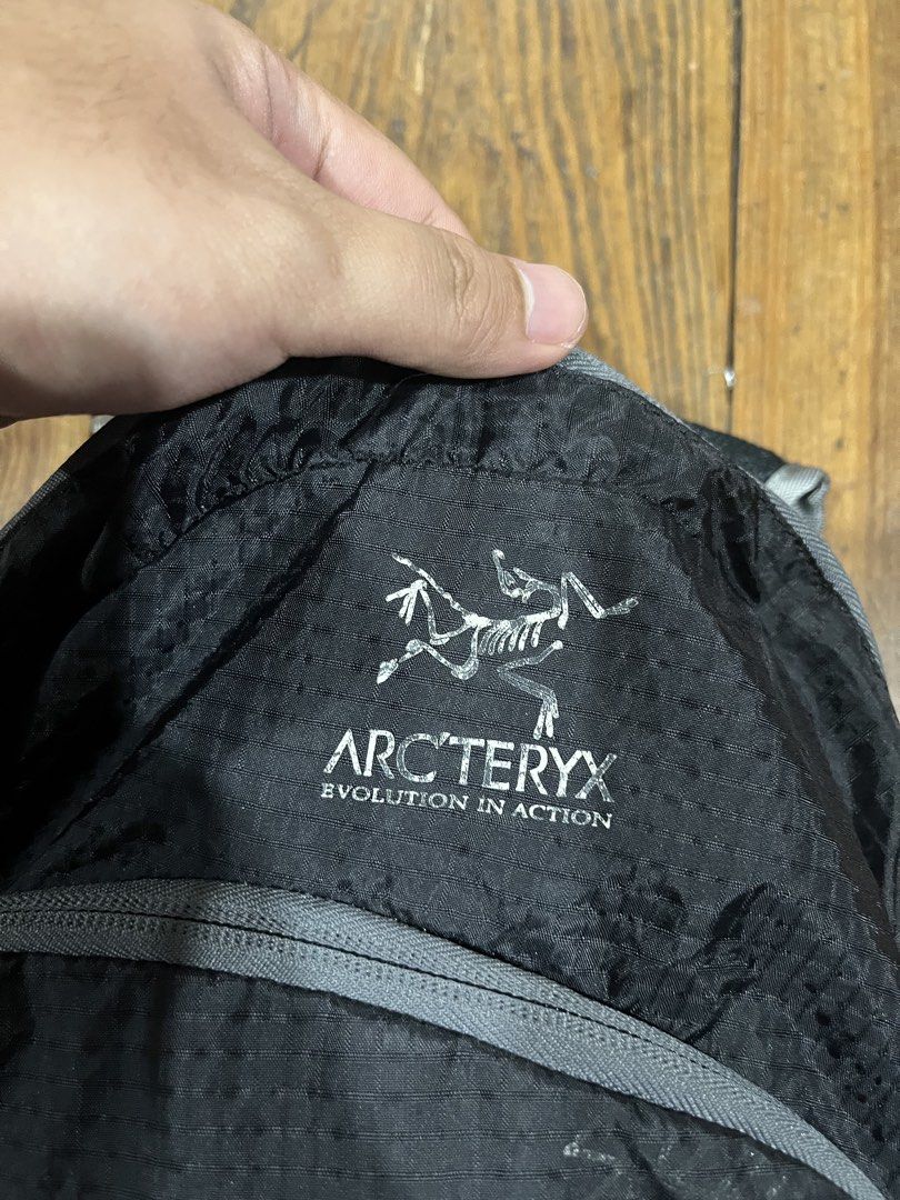 Arc’teryx Daypack Backpack (Packable) (Category: Backpacks) located in Baguio. Submitted by fishy___fish (Listing ID 1460483154, Image 2). Description: Arc’teryx Daypack Backpack (Packable) Width: 13” Length: 16.5” Print fading.
