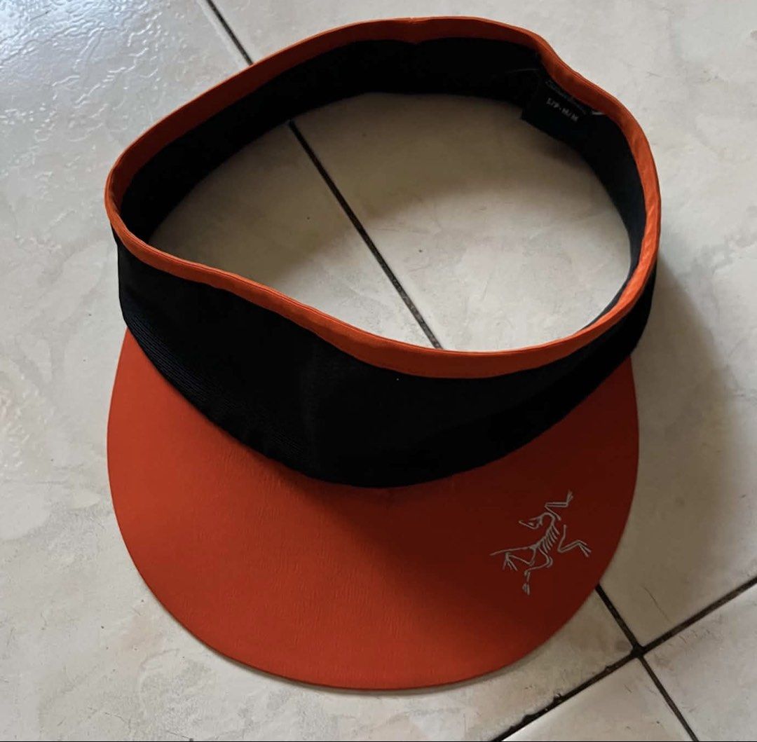 Arc'teryx Neutro Visor S/M (Category: Caps & Hats) located in Cagayan de Oro. Submitted by jonzda1 (Listing ID 1460363934, Image 1). Description: Arc’teryx Neutro Visor S/M - Color: Orange brim with black band - Size: S/P-M/M - Ideal for: Outdoor activities and sports - Features: Sun protection, lightweight, comfortable - Cut washtag but legit 100% - Running Cap.