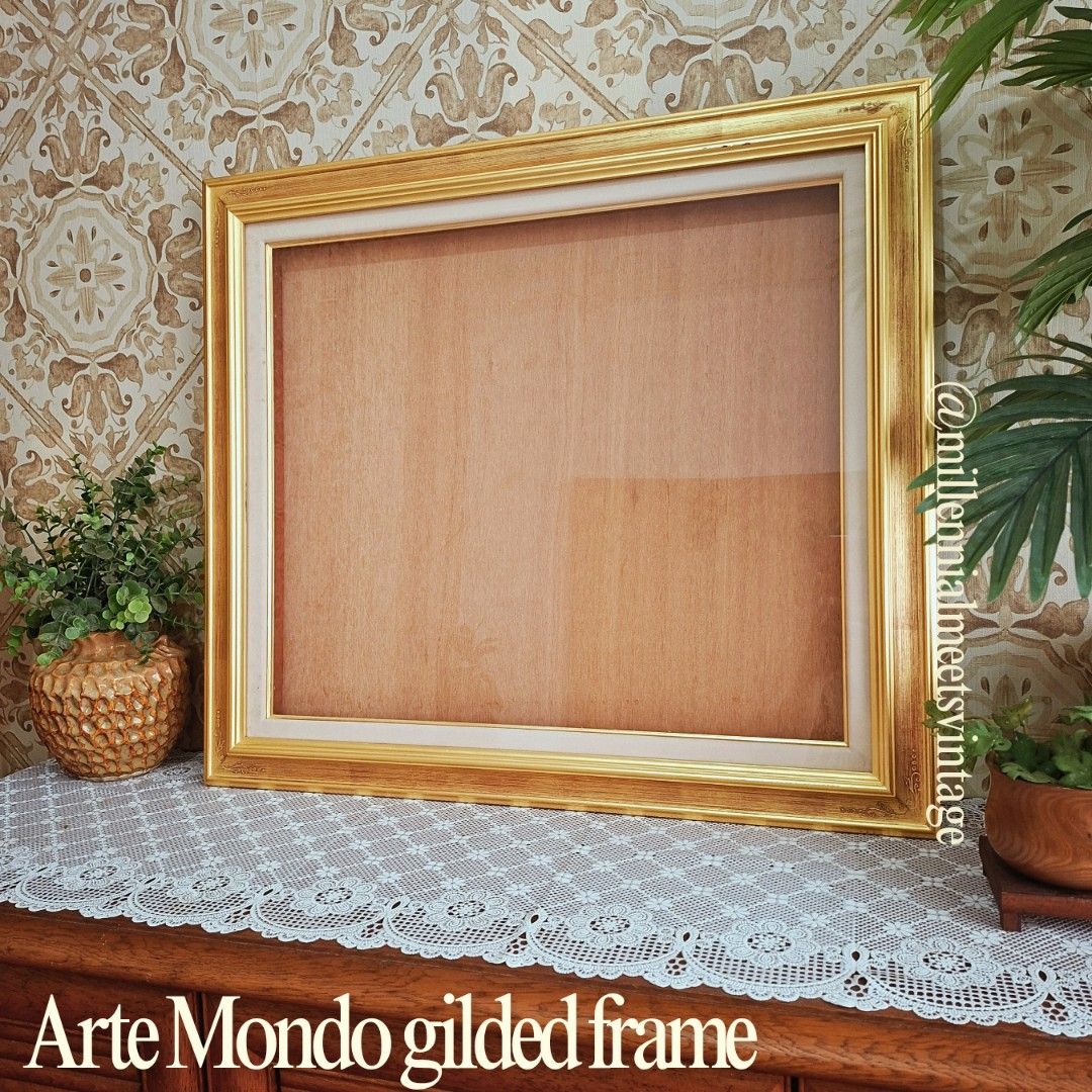 Arte Mondo gilded solid wood photo frame (Category: Frames & Pictures) located in Dasmarinas. Submitted by millennialmeetsvintage (Listing ID 1460412532, Image 1). Description: Frame 66 x 59 cm Fits 52 x 59 cm artwork authentic arte mondo from Japan solid wood glass cover with box flaw shown on photos overall in good condition NOTE: fragile item, pls book lalamove sedan only last price posted, no haggling 🙅🏻‍♀️ 🌍ships from DASMA, CAVITE 🚚 shi