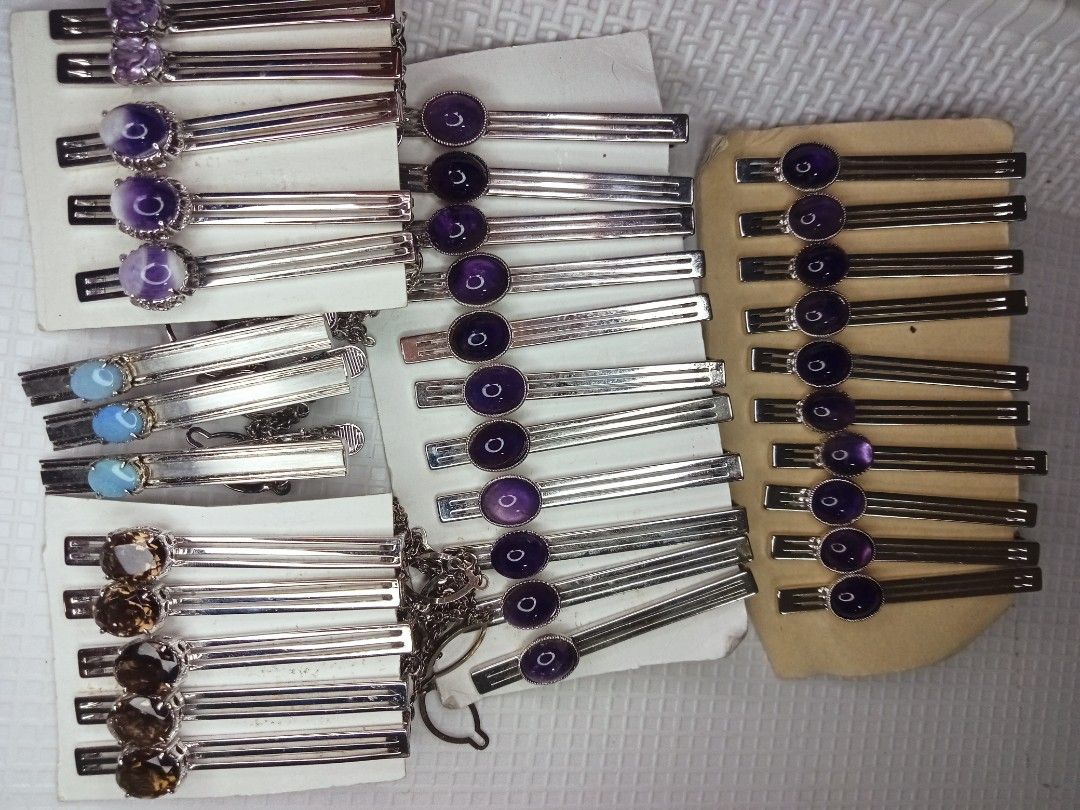 Assorted Gemstone Tie Clips - Silver Tone (Category: Hair Accessories) located in Davao. Submitted by kimpoycaye62726 (Listing ID 1460485769, Image 1). Description: - Assorted tie clips with lovely gemstone details. - Features purple Amethyst, blue opal, and smokey Quartz gemstones. - Secured with durable silver-tone metal clasps. - Some clips include elegant chain accents. - Perfect for adding a stylish touch to any outfit. - All items are in go