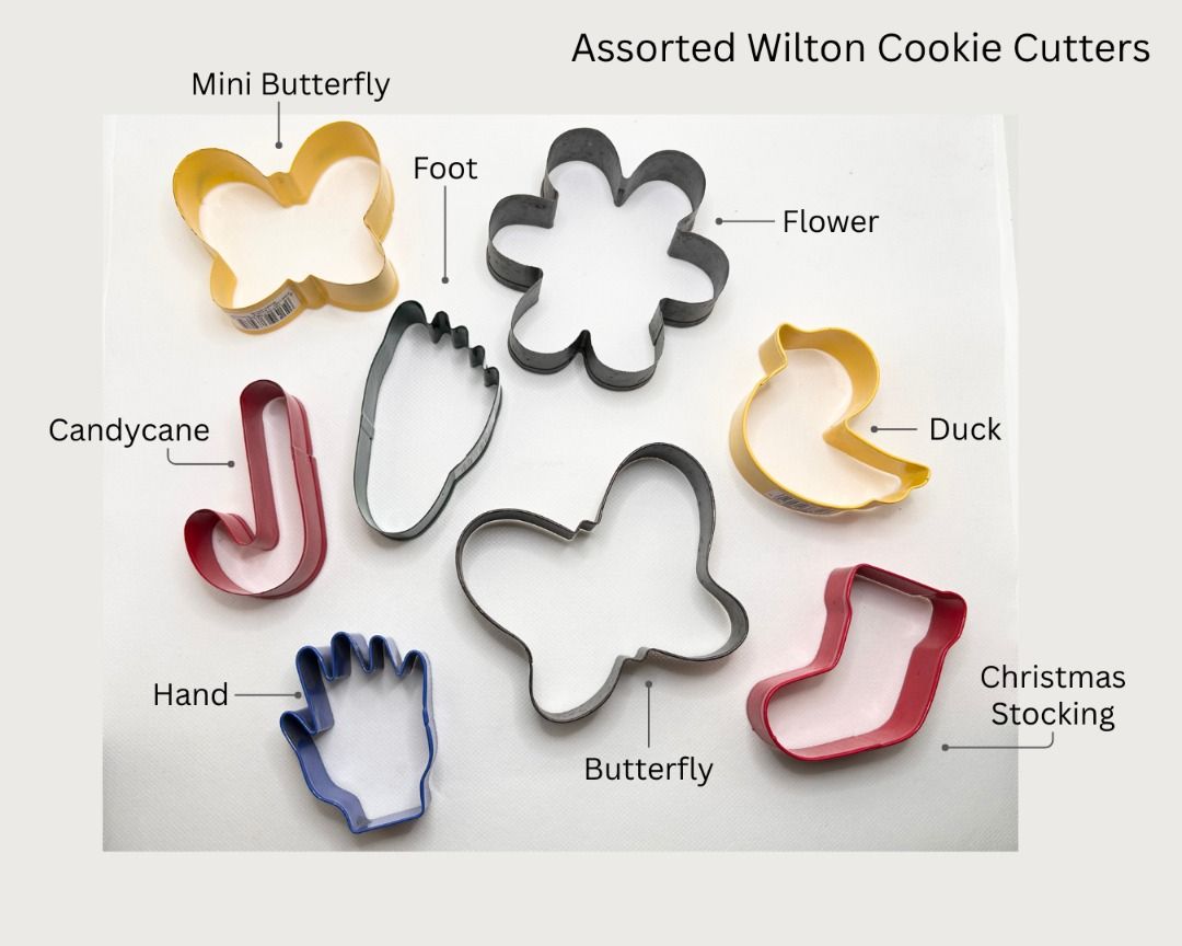 Assorted Wilton Cookie Cutters (Category: Bakeware) located in Antipolo. Submitted by deniserl (Listing ID 1460474511, Image 1). Description: - Includes shapes: Mini Butterfly, Candy Cane, Hand, Flower, Big Butterfly, Foot, Duck, Christmas Stocking. - Made from durable metal and colored plastic. - Perfect for baking cookies, pastries, or crafts. - Price: ₱50 - RFS: Decluttering unused products! - MOD: Pickup in Antipolo, Makati, Quezon City, or M