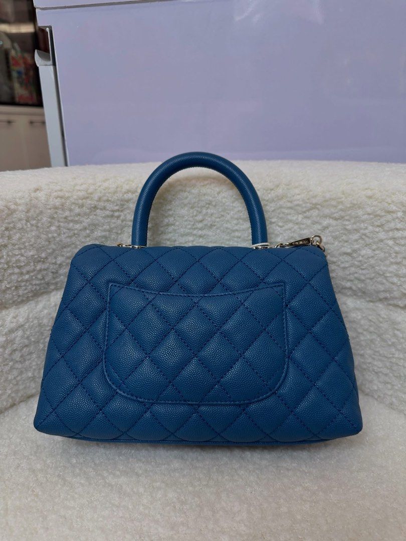 Authentic Chanel (Category: Luxury Apparel) located in Manila. Submitted by chloe_luxuries (Listing ID 1460457090, Image 2). Description: Guaranteed Original Chanel Coco Handle small tael color caviar gold hardware Series 31 Comes with dustbag Pm for more details.