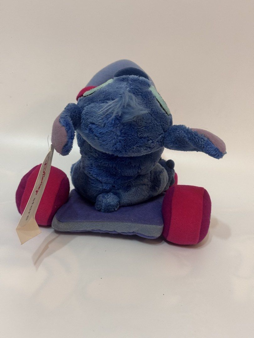 Authentic Disney Store Stitch on Tricycle Plush (Category: Plushies & Soft Toys) located in Antipolo. Submitted by bhabiegraciefashionlab (Listing ID 1460506079, Image 2). Description: Selling an authentic Disney Store Stitch on Tricycle plush in excellent, brand-new condition with the original tag still attached! Character: Stitch (from Lilo & Stitch)Features: Stitch is riding a colorful plush tricycle (blue, purple, and bright pink). Condition: