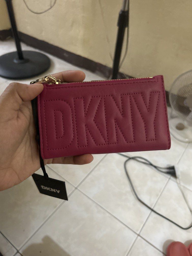 Authentic DKNY Wallet (Category: Wallets & Card holders) located in Cebu City. Submitted by karent3000 (Listing ID 1460467615, Image 1). Description: Authentic DKNY Wallet Never been used With tags.