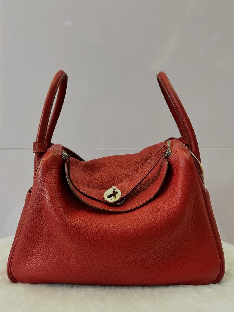 Authentic Hermes (Category: Luxury Apparel) located in Manila. Submitted by chloe_luxuries (Listing ID 1460366497, Image 1). Description: Guaranteed Original Hermes Lindy Rouge 30 Palladium hardware stamp P squared Still in very good condition Comes with dustbag Pm for those interested .