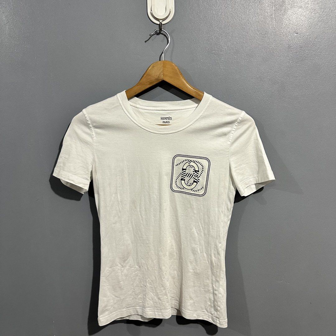 Authentic Hermes shirt (Category: Blouses) located in Mangaldan. Submitted by restyle.fitv2 (Listing ID 1460429249, Image 1). Description: Authentic Hermes shirt Size 36 Small Length 22 Width 16 No issue.
