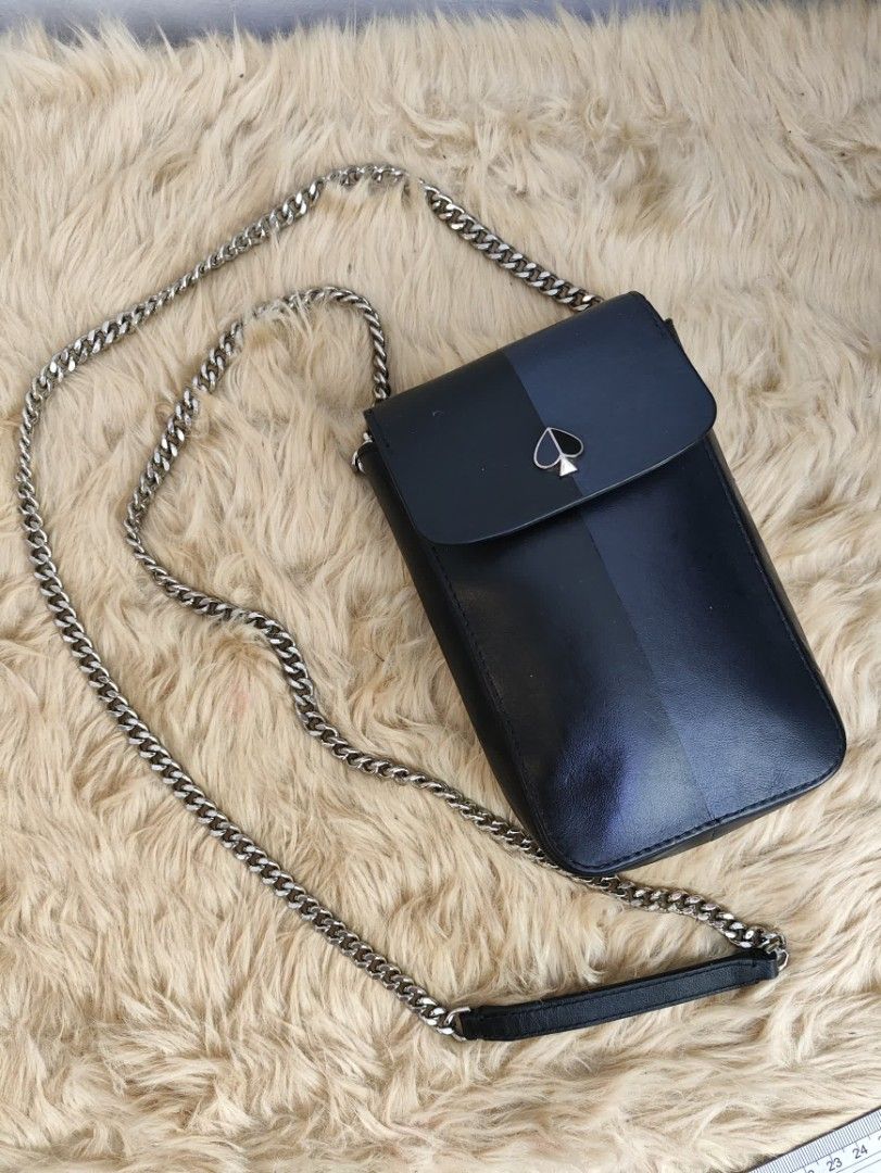 Authentic Kate Spade Nicola flap cp sling (Category: Cross-body Bags) located in Rizal. Submitted by hsiri1128 (Listing ID 1460402433, Image 1). Description: 💯✔️Legit CONDITION : 8/10 ISSUE / FLAWS : None. Normal signs of use only MATERIAL : Genuine satchel leather w/ silver hardwares DETAILS : Fit cp up to 6.7". structured leather with chain strap..