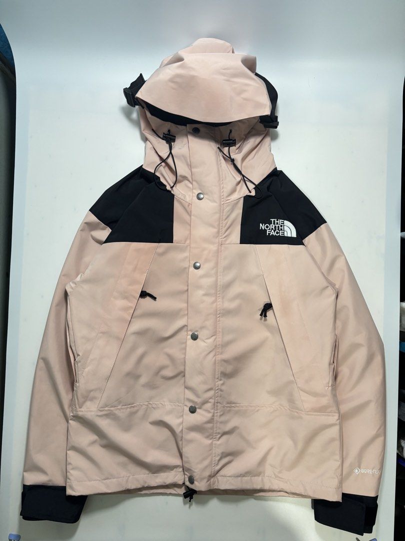 Authentic The North Face 1990 Gore-Tex Pink Black Jacket (Category: Coats, Jackets and Outerwear) located in Cavite. Submitted by sidirvinp76902 (Listing ID 1460464603, Image 1). Description: - The North Face jacket in pink and black -xs 22x27 dimensions - Waterproof Gore-Tex material - Adjustable hood and hem for a custom fit - Secure zipper and snap button closure - Two front pockets with snap button closures - Iconic logo on chest and sleeve -