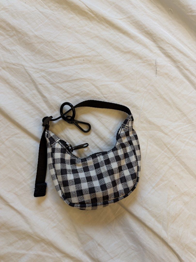 Baggu Gingham Crescent Bag charm (Category: Shoulder Bags) located in Manila. Submitted by rjsv12345 (Listing ID 1460409457, Image 1). Description: - Brand: Baggu - Style: Crescent Shoulder Bag charm - Pattern: Black and White Gingham - Closure: Zipper - Strap: Adjustable with buckle and clip .