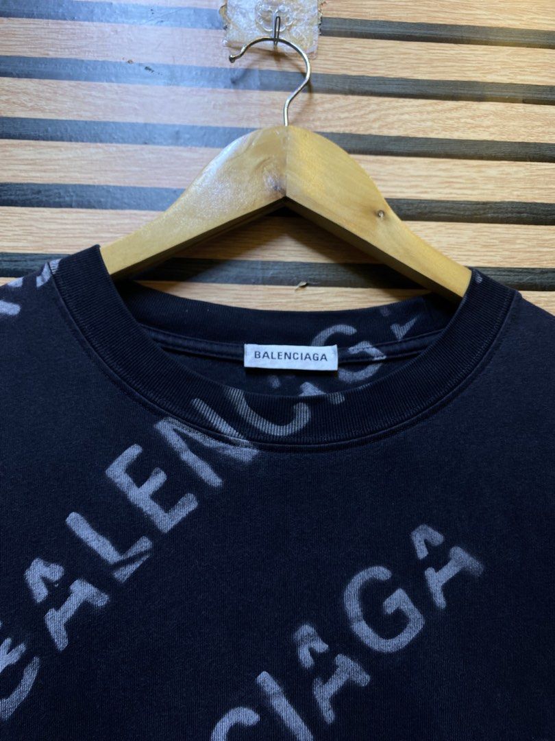 BALENCIAGA ALL OVER PRINT (Category: Tshirts & Polo Shirts ) located in Makati City. Submitted by drip.poww (Listing ID 1460465653, Image 3). Description: - Authentic Balenciaga - Color: Black - Size: Meduim - Dimes: 21x29 - Authentic - Excellent condition - Need wash, fresh from bale - Material: 100% Cotton Please don’t expect too much—these are thrifted (ukay) items. 😊 !!STILL NEGOTIABLE!!.