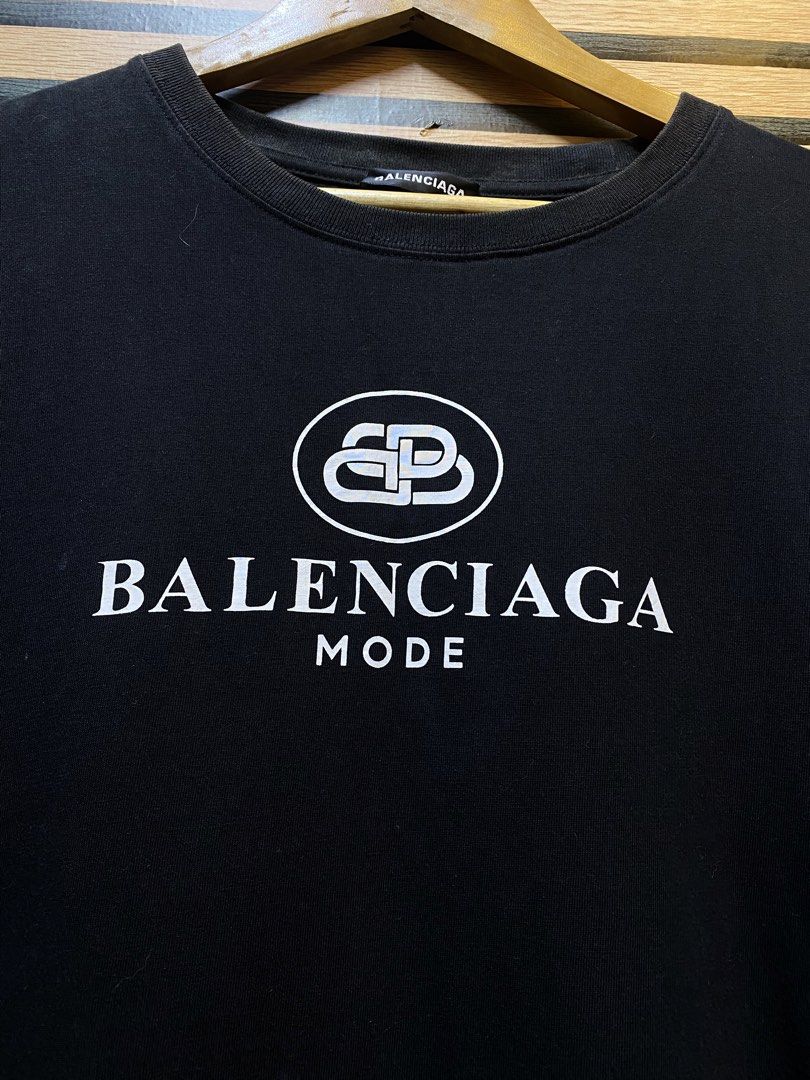 Balenciaga “BB Mode” T (Category: Tshirts & Polo Shirts ) located in Makati City. Submitted by drip.poww (Listing ID 1460433156, Image 3). Description: - Authentic Balenciaga - Color: Black - Size: XL - Dimes: 25x30 - Authentic - Excellent condition - Need wash, fresh from bale - Material: 100% Cotton Please don’t expect too much—these are thrifted (ukay) items. 😊 !!STILL NEGOTIABLE!!.