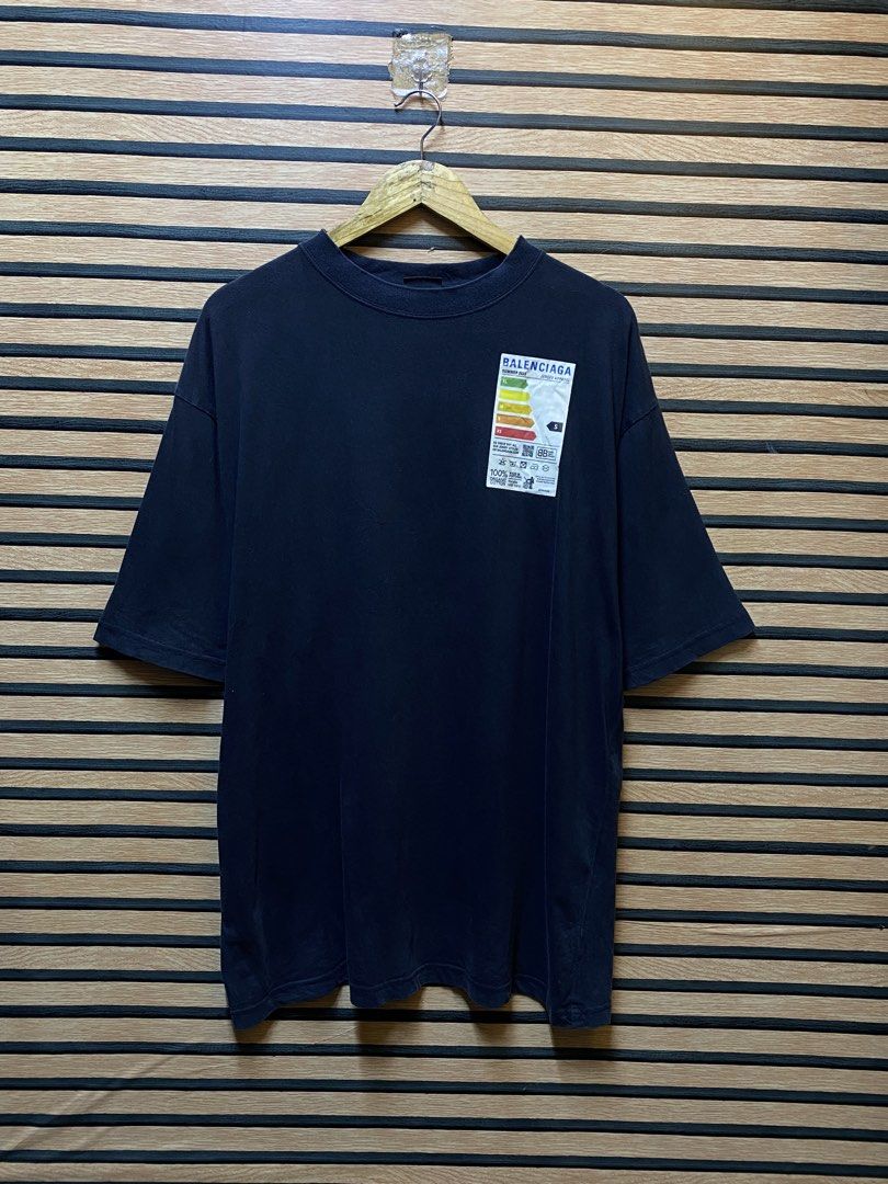 BALENCIAGA FRIDGE STAMP TEE (Category: Tshirts & Polo Shirts ) located in Makati City. Submitted by drip.poww (Listing ID 1460431900, Image 1). Description: - Authentic Balenciaga - Color: Black - Size: XL - Dimes: 25x31 - Authentic - Excellent condition - Need wash, fresh from bale - Material: 100% Cotton Please don’t expect too much—these are thrifted (ukay) items. 😊 !!STILL NEGOTIABLE!!.