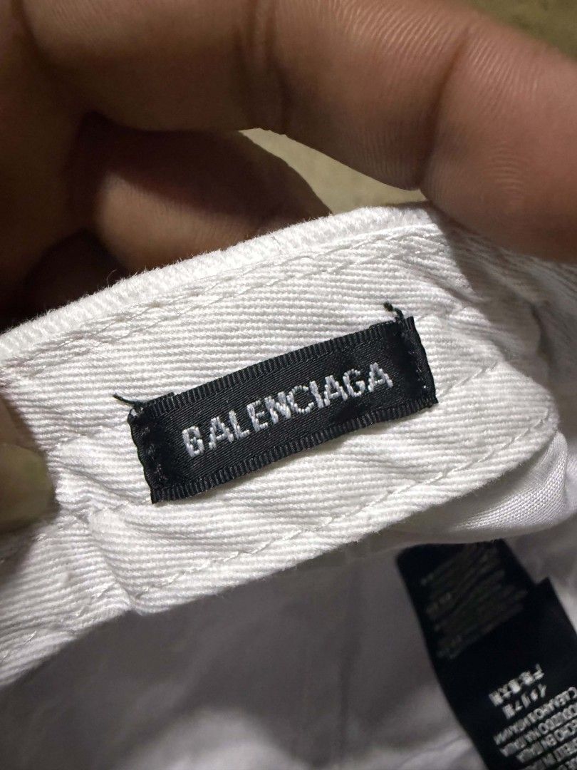 Balenciaga White Embroidered Logo Cap (Category: Caps & Hats) located in Manila. Submitted by thriftyboyzzz (Listing ID 1460468047, Image 3). Description: - Authentic White Balenciaga Cap - Features embroidered logo on the front - Made in Italy - 100% Cotton - Adjustable strap at the back - Ideal for everyday wear - Please check photos for detailed condition.
