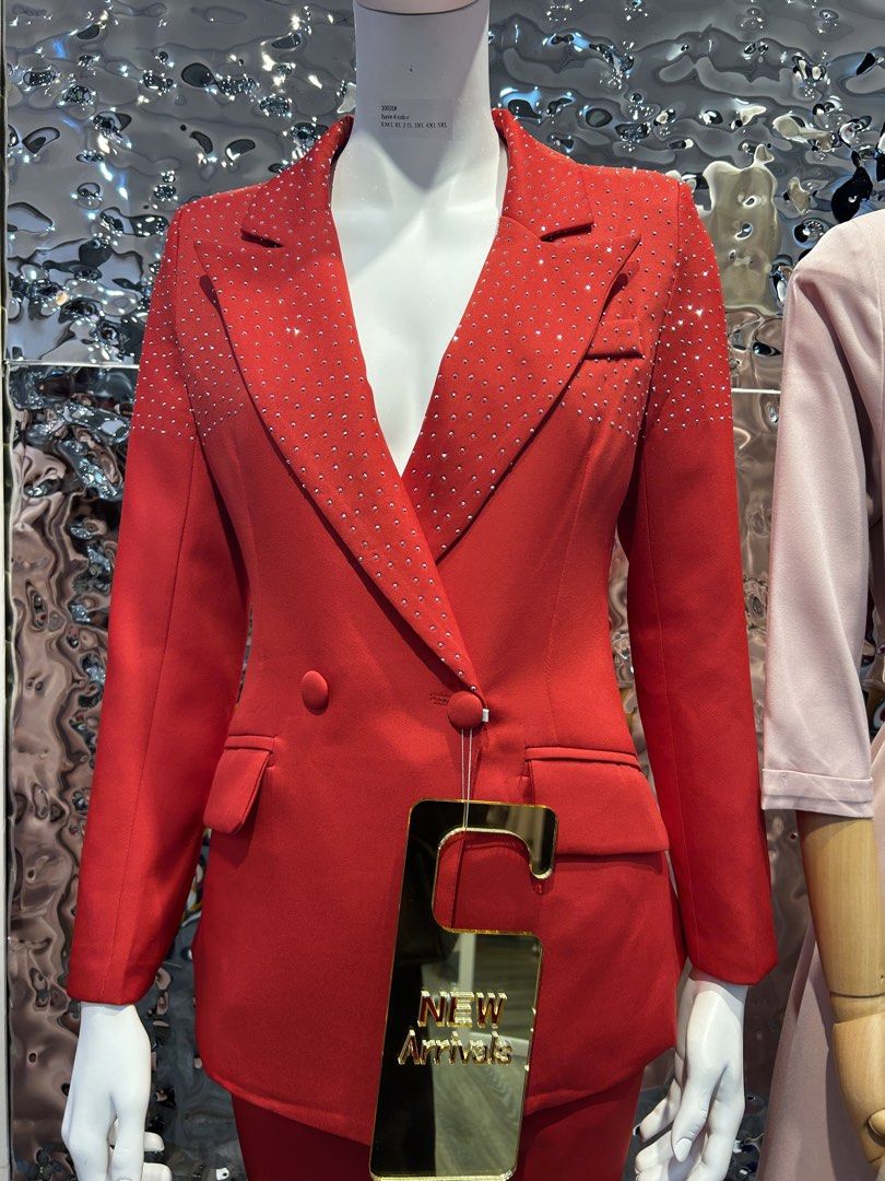 Bangkok Red Studded Double-Breasted Blazer (Category: Coats, Jackets and Outerwear) located in Nabua. Submitted by clementina_studio (Listing ID 1460390219, Image 1). Description: Stunning sharp red blazer with pants Eye-catching sparkly studs on lapels and shoulders Classic double-breasted style with two buttons Versatile: perfect for a night out or a formal event Brand new used Bought in Bangkok Thailand for 5K.