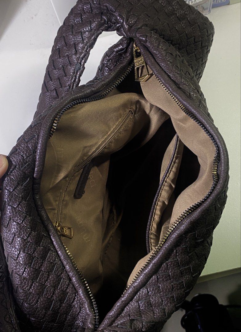 Banig Woven Bag (Dark Brown) (Category: Shoulder Bags) located in Manila. Submitted by blumarined.xo (Listing ID 1460467295, Image 2). Description: Large woven banig bag in black, featuring a classic and durable woven design with a spacious interior that can comfortably fit an iPad and other essentials. **Like-new condition, slightly used, and well-maintained.** .