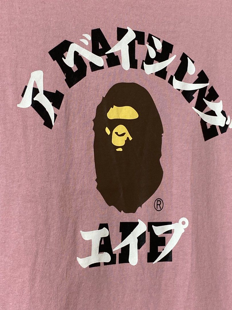 Bape Katakana College Tees (Category: Tshirts & Polo Shirts ) located in Quezon City. Submitted by loloyz123 (Listing ID 1460450709, Image 2). Description: Bape Katakana College Tees- Womens Condition: Very good Color rate: 10/10 Color: Pink Size: Small L: 25 W: 18 inches.