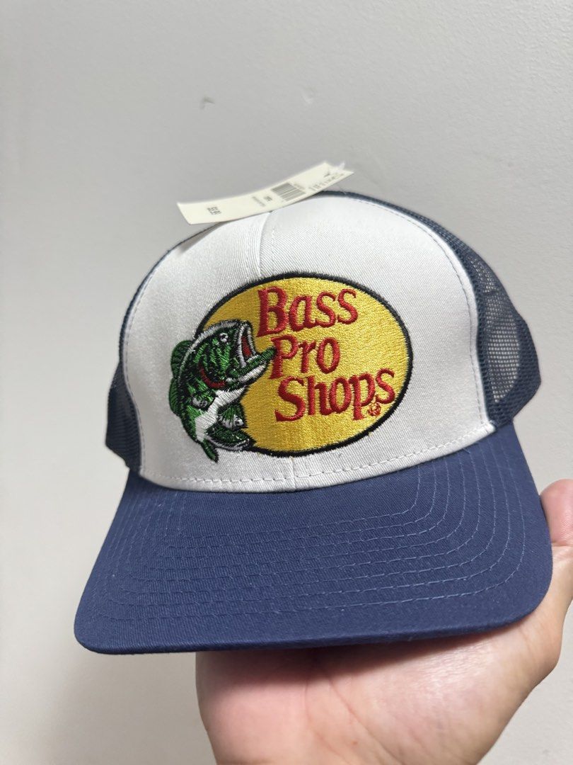 Bass Pro Shops Trucker Hat - Various Colors (Category: Caps & Hats) located in Cavite. Submitted by reygab (Listing ID 1460327677, Image 3). Description: - Classic Bass Pro Shops trucker hats - Features iconic embroidered fish logo - Mesh back for excellent breathability - Available colors: Light Blue, Navy, Tan/Black - Perfect for fishing or everyday wear - One size fits most Open for bulk buyers Embriodered ₱300 Printed 230 Shipped via lbc or l