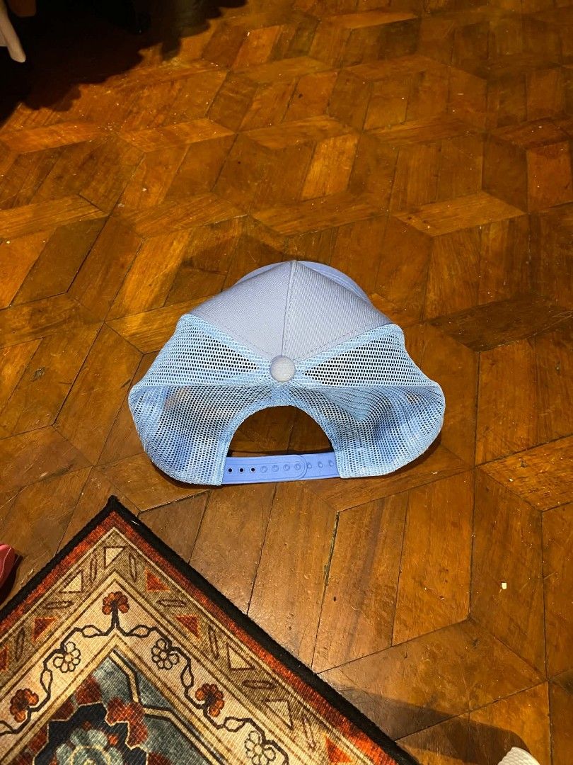 Bass Pro Shops Trucker Hat Light Blue Mesh Cap (Category: Caps & Hats) located in Pasig City. Submitted by paulclzdo (Listing ID 1460404070, Image 3). Description: - Light blue Bass Pro Shops trucker hat - Breathable mesh back - Adjustable strap for a custom fit - Classic oval logo on the front - Ideal for fishing trips or everyday casual wear - One size fits most.