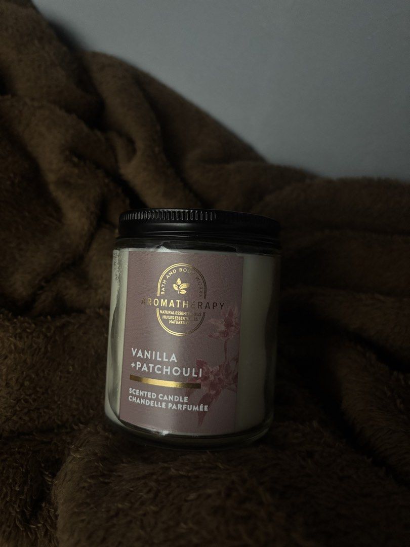 Bath & Body Works Aromatherapy Vanilla + Patchouli Scented Candle (Category: Home Fragrance) located in Zamboanga. Submitted by silverfrost (Listing ID 1460426537, Image 1). Description: 📌 1 Wick Vanilla + Patchouli Weight: 7 oz (approx. 198 grm Fragrance notes: sweet vanilla patchouli, Italian bergamot, and cedarwood..