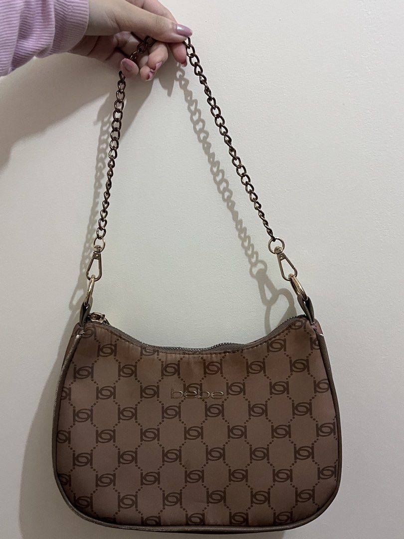 BEBE shoulder baguette bag (Category: Shoulder Bags) located in Pasig City. Submitted by skydecluttering (Listing ID 1460488213, Image 1). Description: discounted .