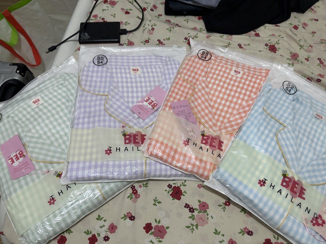 BEE Thailand Gingham Pajama Set - Multiple Colors (Category: Undergarments & Loungewear) located in Marikina City. Submitted by natalienase (Listing ID 1460462555, Image 1). Description: BRAND NEW BEE Thailand Gingham Pajama Sets 500 pesos each - Available Sizes: can fit up to 6XL - Colors: Light Green, Lavender, Peach, Light Blue - Material: Soft and comfortable fabric - Perfect for lounging and sleepwear MOP: Gcash/Maribank/Bank Transfer MOD: L